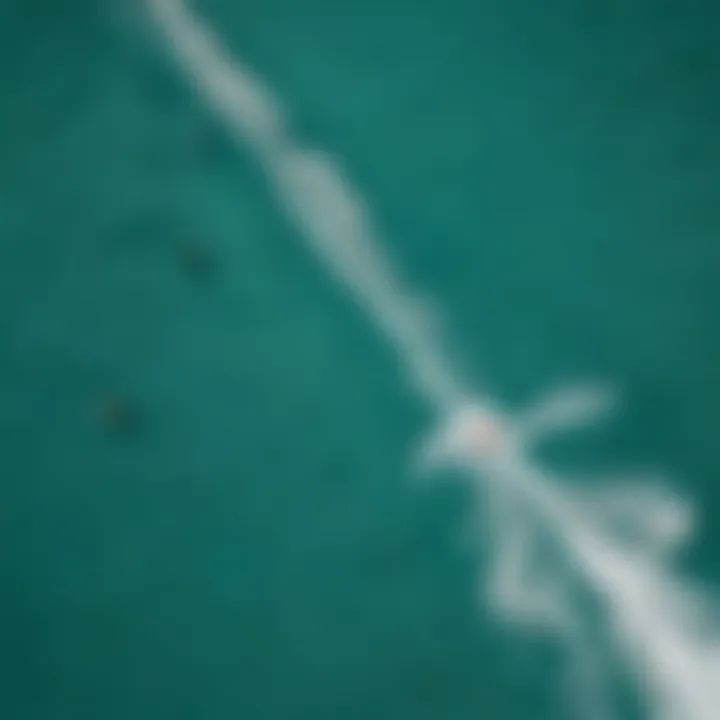 An aerial view of kiteboarders gliding over turquoise waters in Florida.