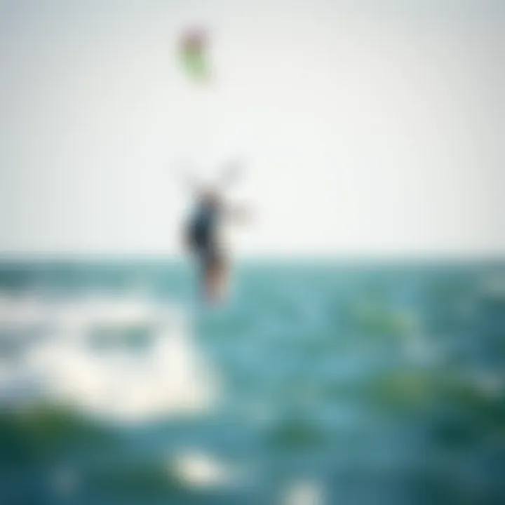 Kiteboarder gliding effortlessly above the water using a mini hydrofoil.