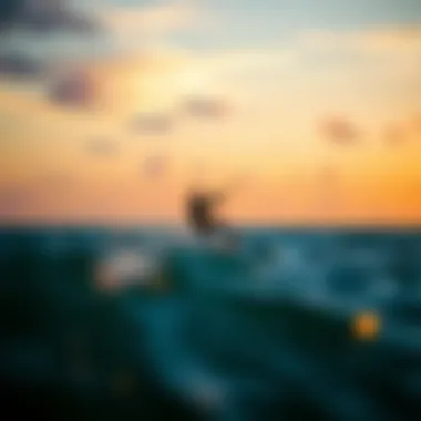 A kiteboarder expertly navigating the waves during sunset.
