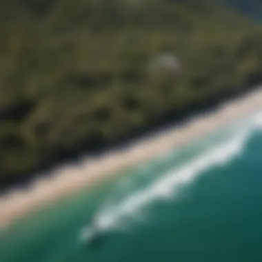 Aerial view of a kiteboarding session featuring the Flite kite against a scenic backdrop