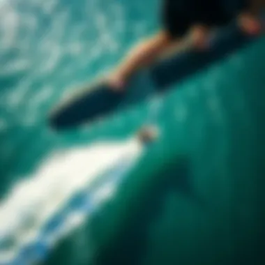 A stunning view of a rider gliding above the water on a hydrofoil.