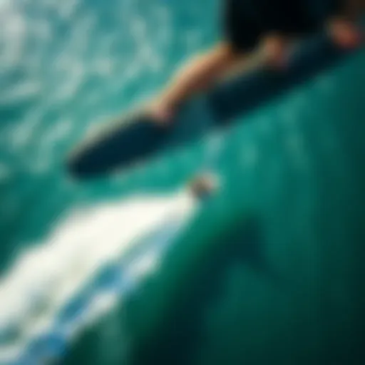 A stunning view of a rider gliding above the water on a hydrofoil.