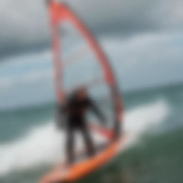 A windsurfing enthusiast adjusting their dry suit before hitting the waves