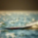 A sleek foil board gliding over the water