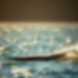 A sleek foil board gliding over the water