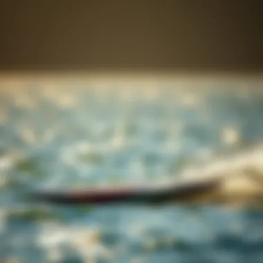 A sleek foil board gliding over the water