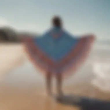 Stylish poncho towels on a beach