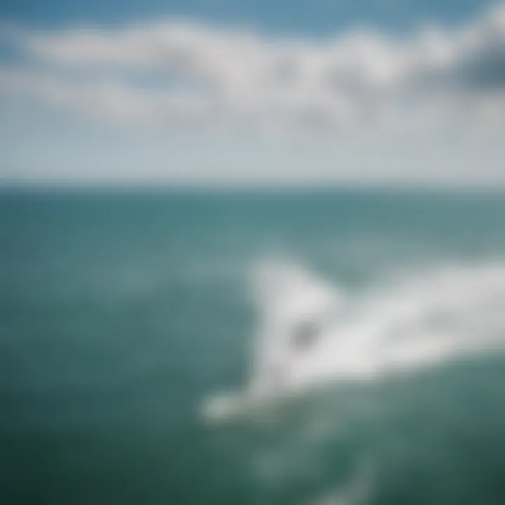 An aerial view of a vibrant kitesurfing competition on a windy day