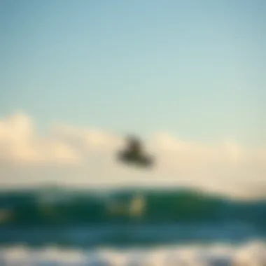 Kiteboarder gliding over the water at Tourmaline