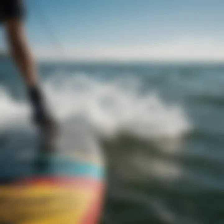 Close-up of a kiteboard's edge interacting with water