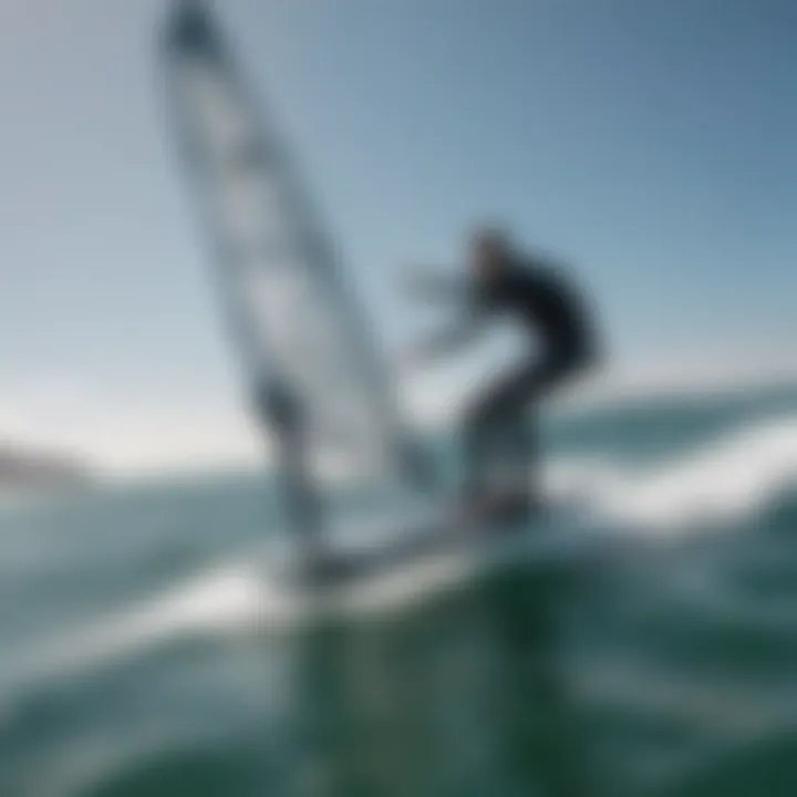 An experienced rider demonstrating advanced techniques on a foiling sailboard in dynamic conditions.