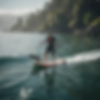 A tranquil water scene with a hydrofoil paddleboarder navigating through calm waves.