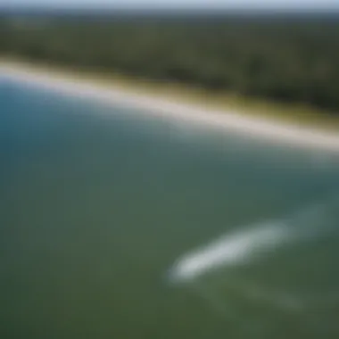 An aerial view capturing the perfect kiteboarding conditions influenced by Jax tides