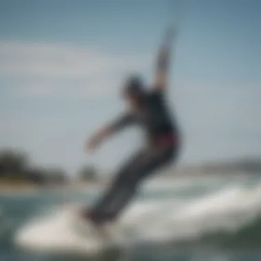 Kiteboarder performing tricks while using a Dakine harness in action