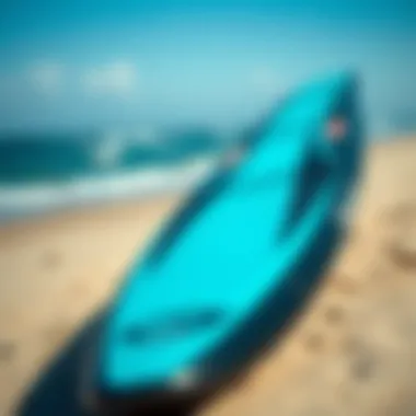 Close-up of a kitesurf board on the beach