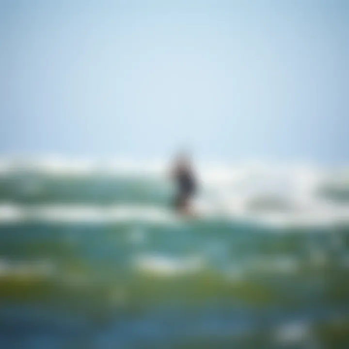 Kiteboarder riding the waves in strong winds