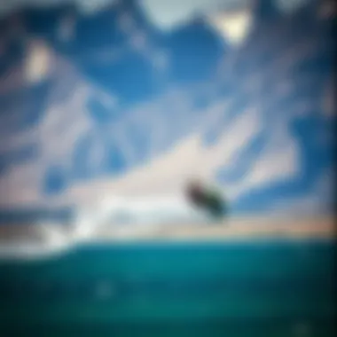 Aerial view of kiteboarding activity against the Rocky Mountains