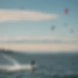 A scenic view of kiteboarders gliding over the waters of Puget Sound with clear skies