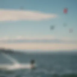 A scenic view of kiteboarders gliding over the waters of Puget Sound with clear skies