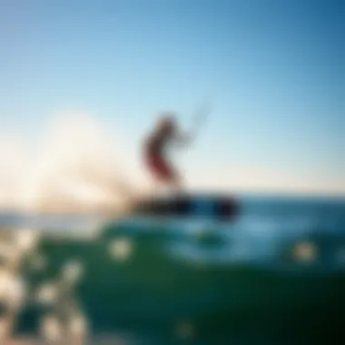 A dynamic action shot of a wingfoiler performing tricks on the water